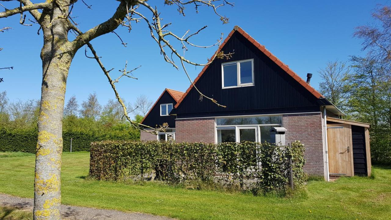 Villa De Rakken à Woudsend Extérieur photo