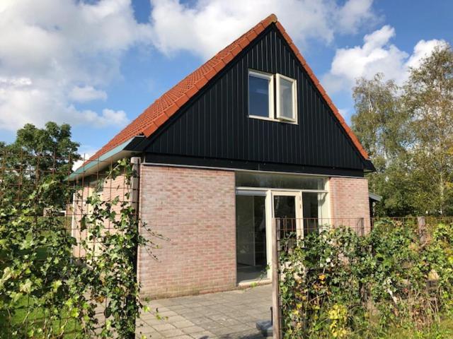 Villa De Rakken à Woudsend Extérieur photo